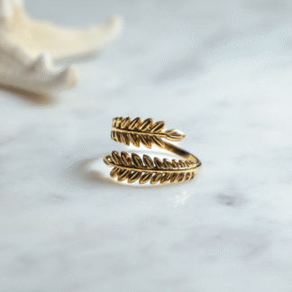 Anillo hojas cruzadas plata y dorado