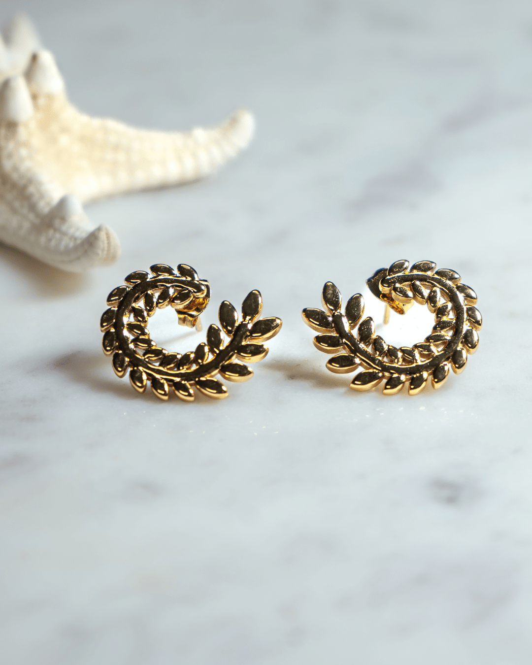 Aretes hojas en c?rculo