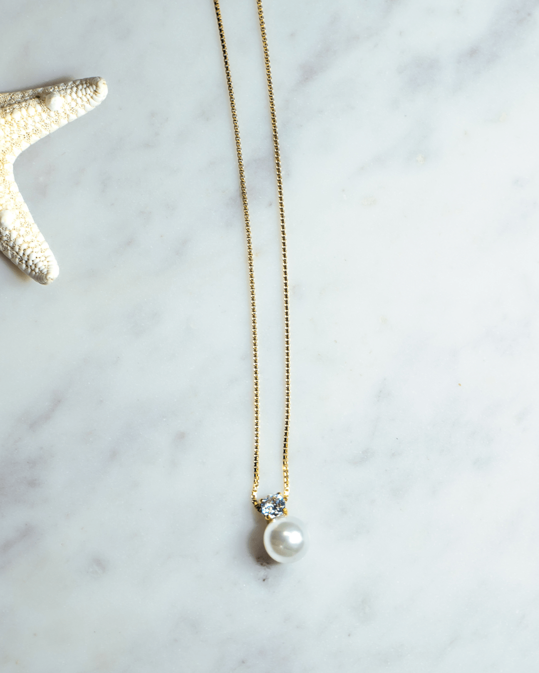 Collar perla con brillo