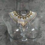 Ivory, gold and bronze beadwork on Sol Dorado choker